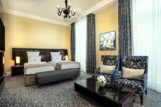 Einblick in ein Deluxe Zimmer mit Twin Bett